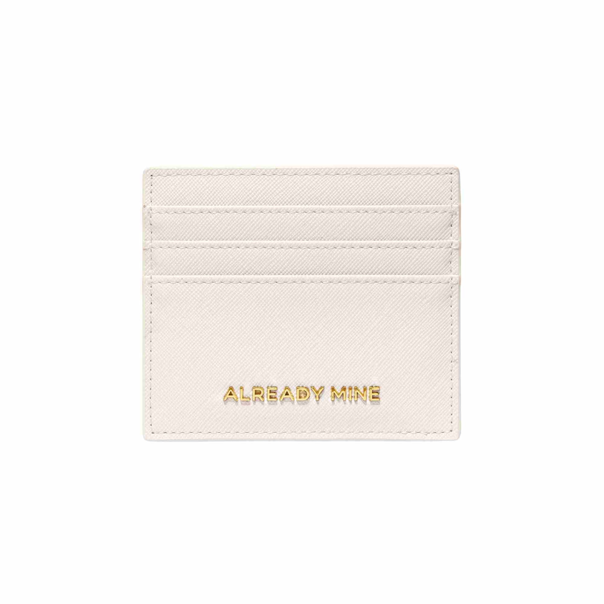 Ecru cardholder with calming Sedona Serenity Spray & carnelian crystals