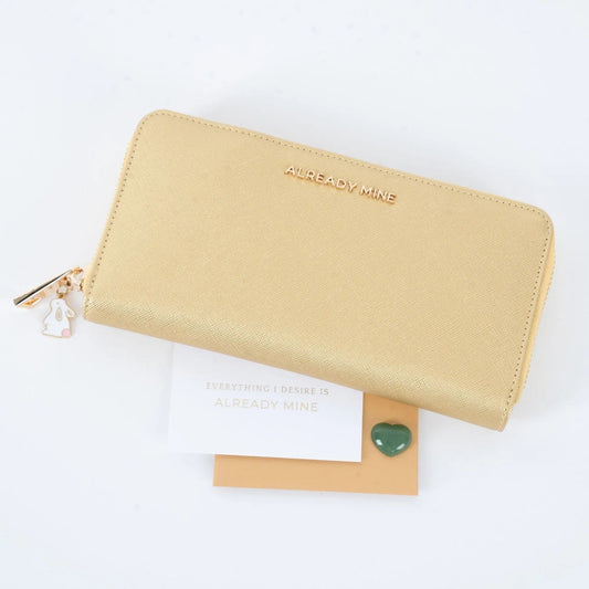 Women gold vegan leather wallet symbolizing abundance, prosperity, and elegant style
