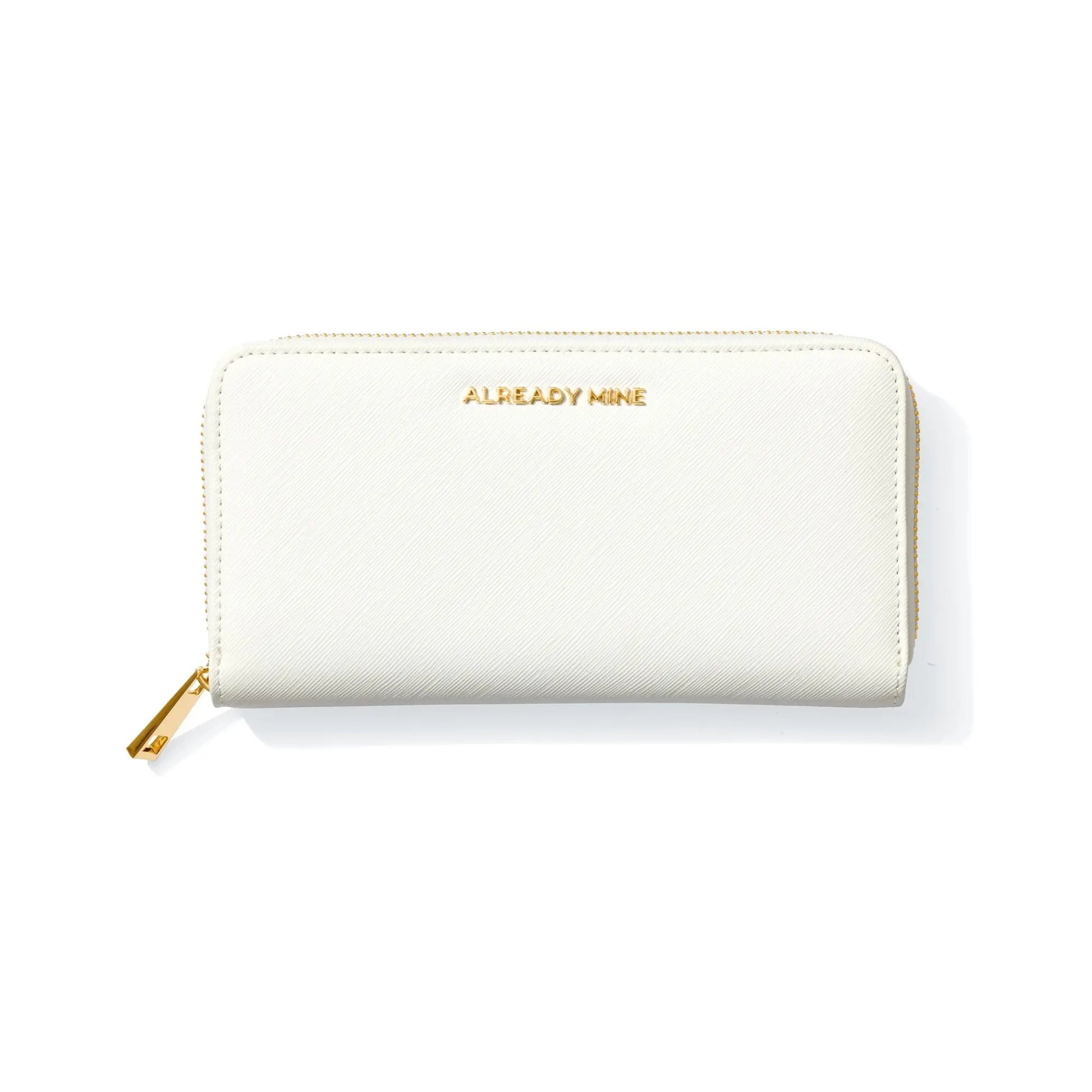 White Manifesting Wallet with "ALREADY MINE" embossing, designed to attract wealth and abundance.