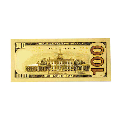 Reverse side of a golden 100 dollar bill showing Independence Hall with a textured metallic gold finish for abundance rituals.