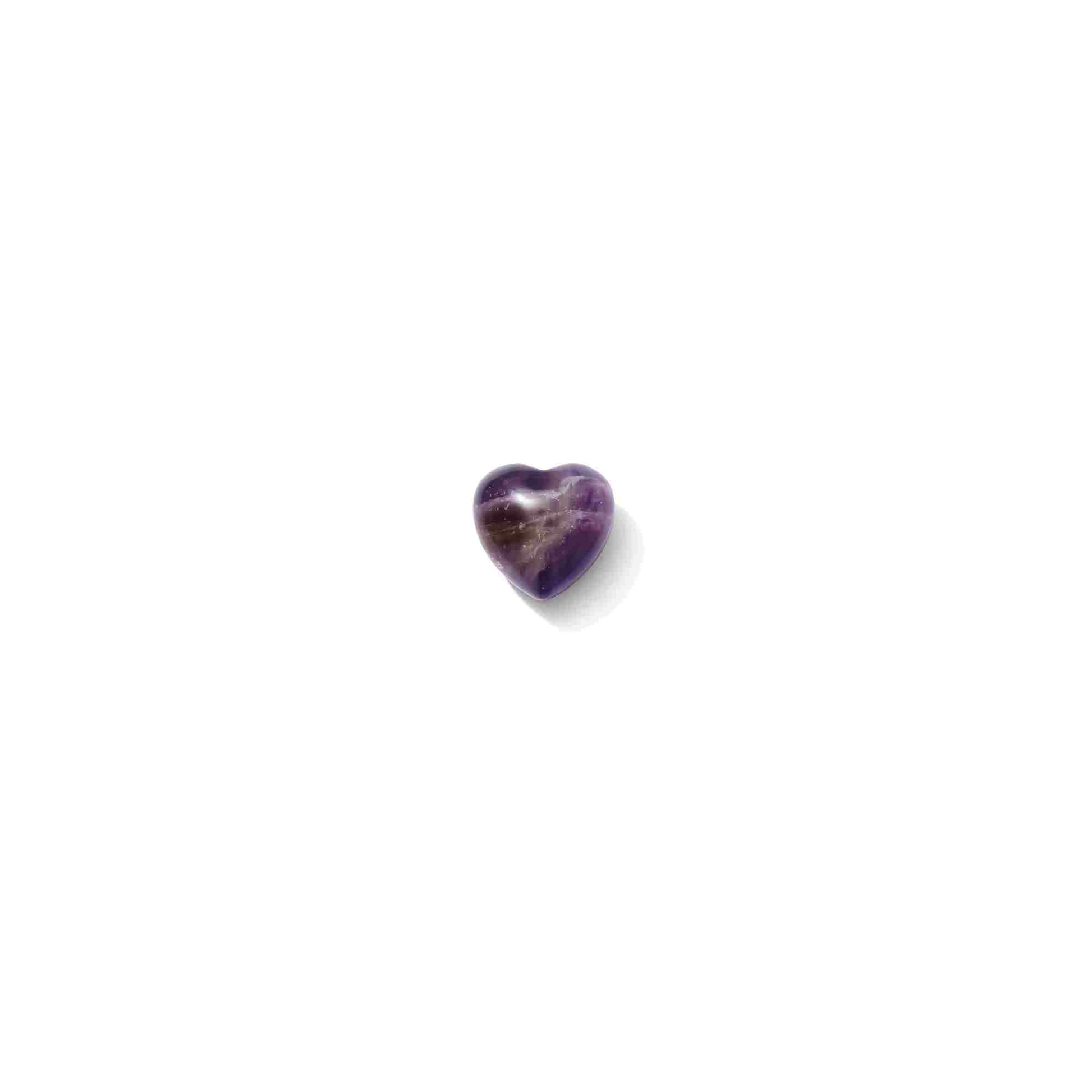 Amethyst heart crystal for intuition and calm, featuring a smooth ergonomic shape perfect for meditation and stress relief.